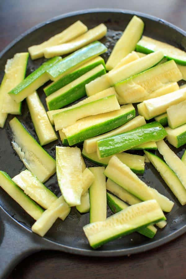 Baked Zucchini with Truffle Oil is the perfect easy side dish! Delicious and quick way to eat up your zucchini crop.