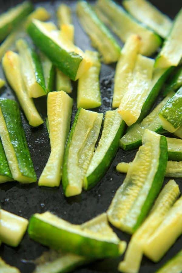 Baked Zucchini with Truffle Oil is the perfect easy side dish! Delicious and quick way to eat up your zucchini crop.