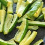 Baked Zucchini with Truffle Oil is the perfect easy side dish! Delicious and quick way to eat up your zucchini crop.