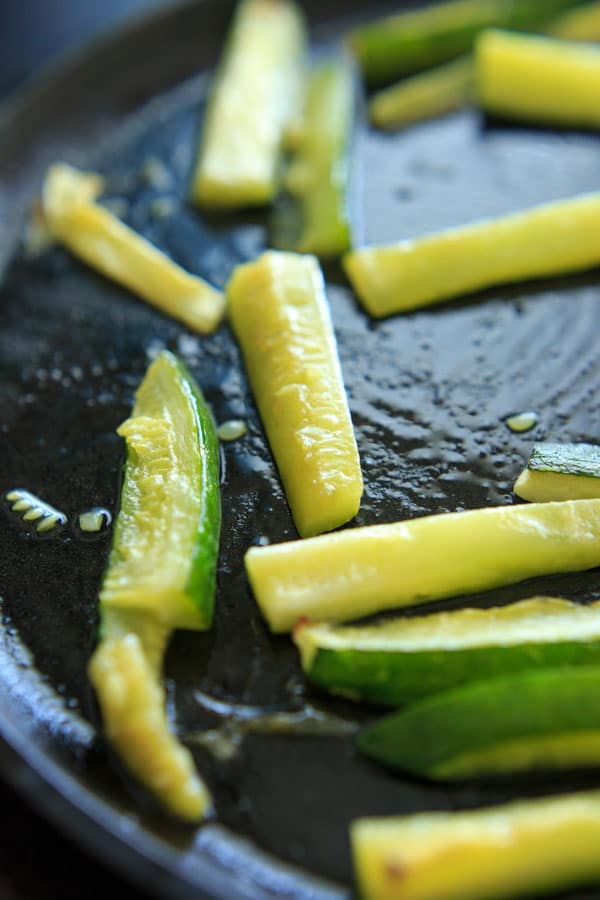 Baked Zucchini with Truffle Oil is the perfect easy side dish! Delicious and quick way to eat up your zucchini crop.