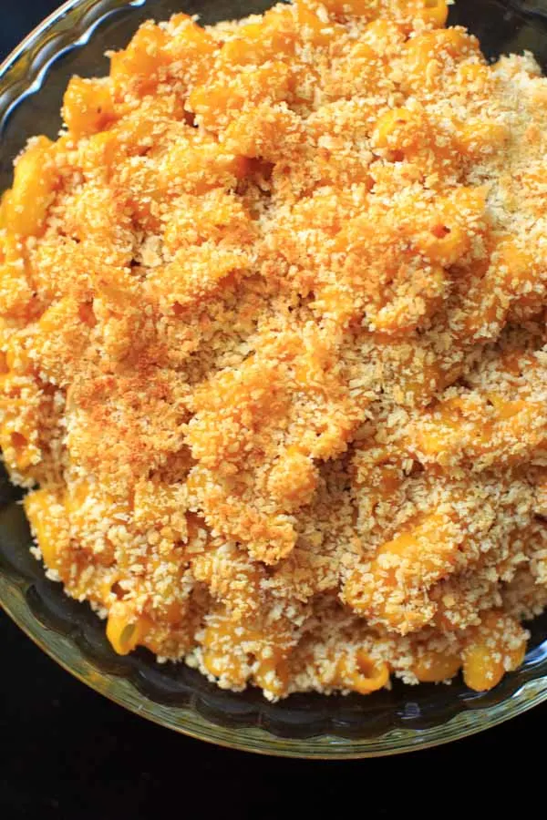 picture of the cheddar pumpkin macaroni made into a casserole by adding panko breadcrumbs