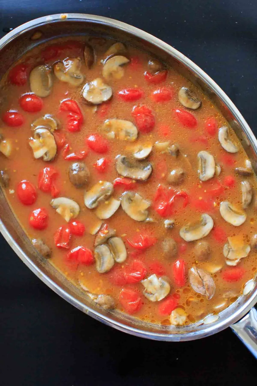 Cheesy Cauliflower Grits with Mushroom and Tomato Gravy. Get your fill of vegetables with this flavorful meal ready in about 20 minutes!