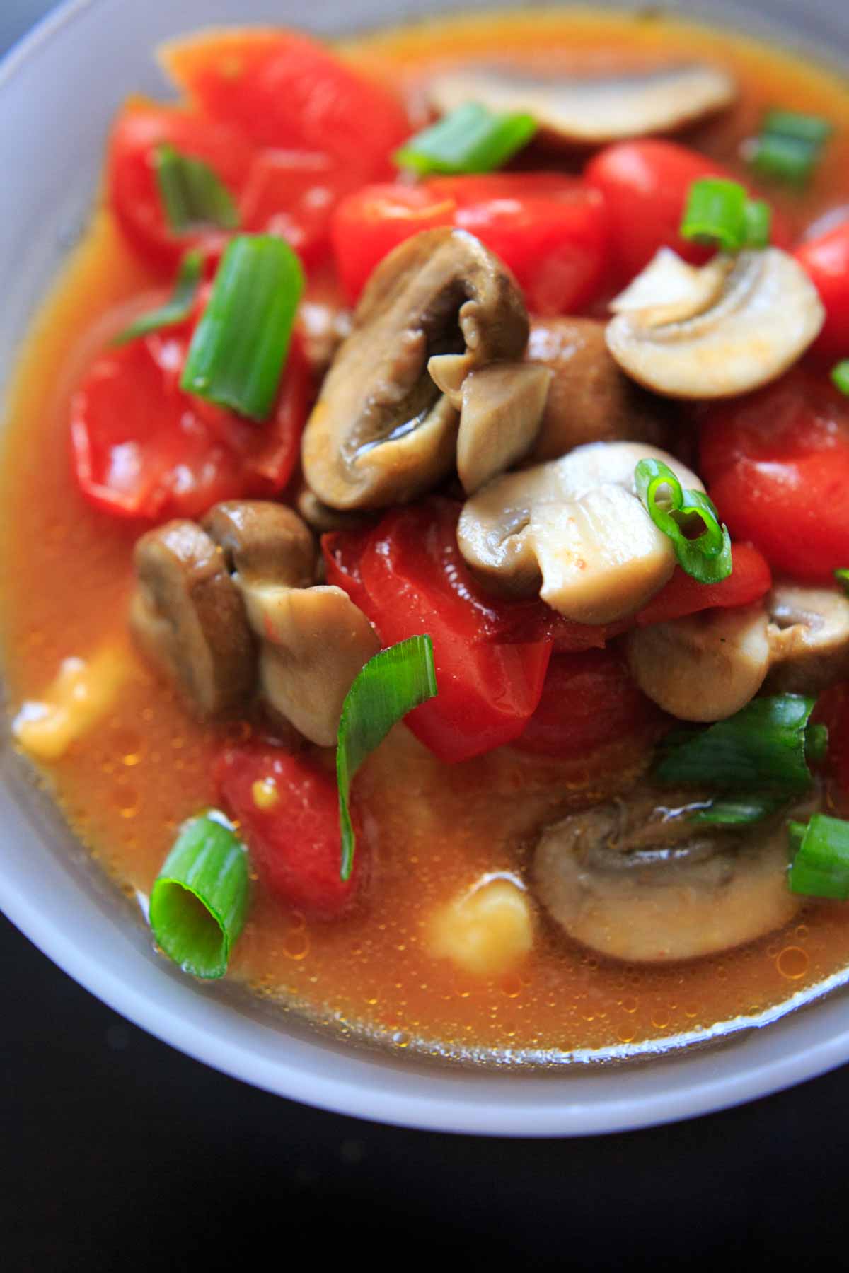 Cheesy Cauliflower Grits with Mushroom and Tomato Gravy. Get your fill of vegetables with this flavorful meal ready in about 20 minutes!