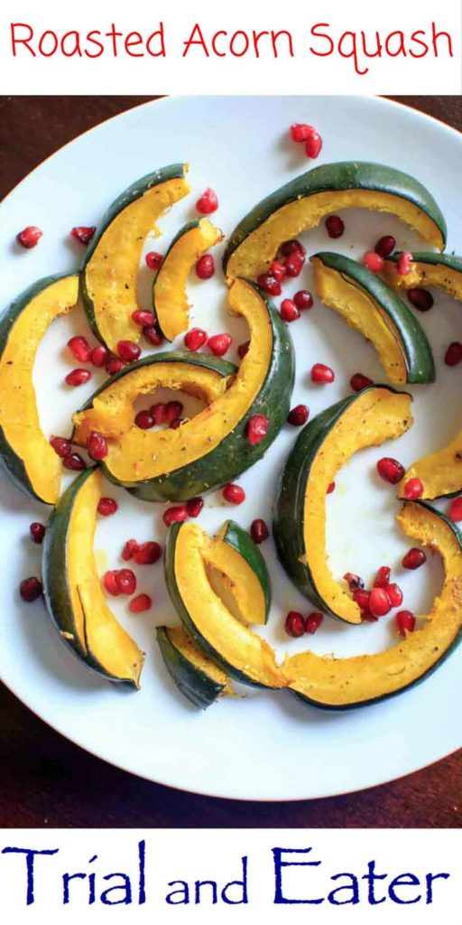 Roasted Acorn Squash with pomegranate seeds. An easy and beautiful side dish for any dinner table.