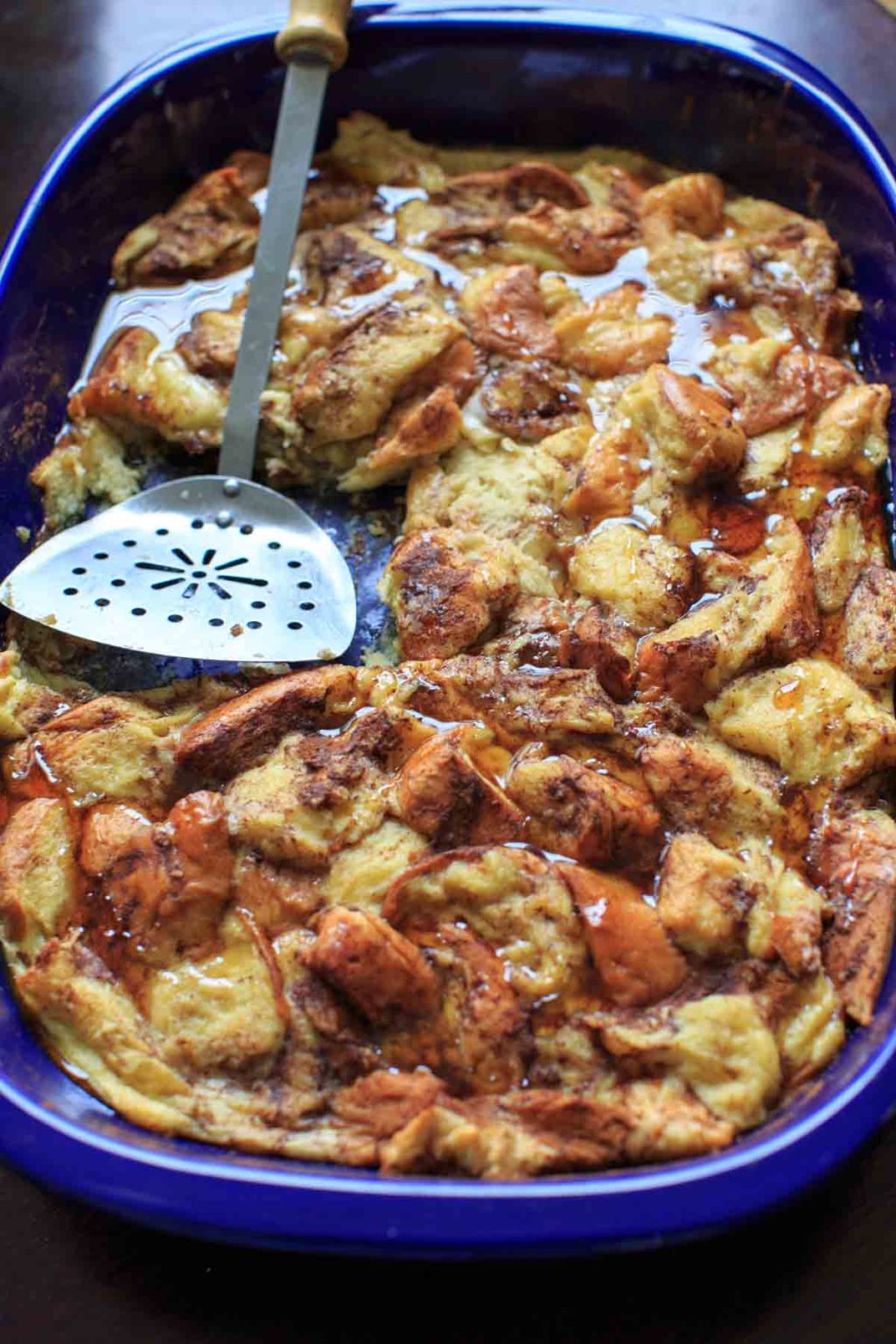 Overnight French Toast Casserole in baking dish with spatula