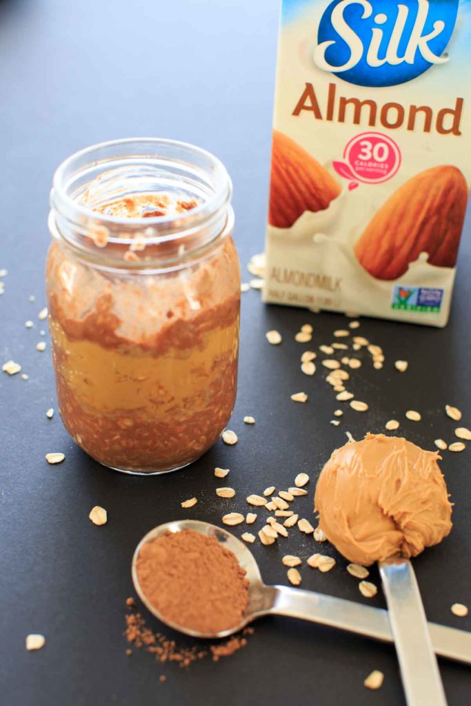 Peanut Butter Chocolate Overnight Oats - a vegan, gluten-free, healthy breakfast that will feel more like dessert than breakfast. Sweetened with maple syrup, no added sugar. Made in partnership with @Silk #ad
