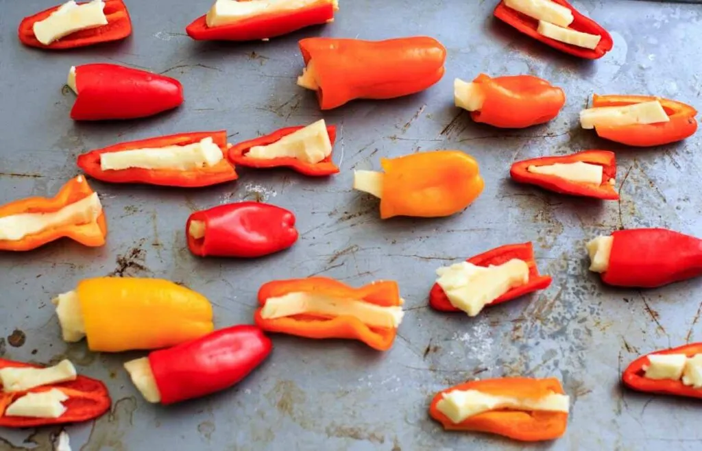 Mini Sweet Pepper Bites with Brie and Sun Dried Tomatoes. A quick vegetarian appetizer or finger food with only 3 ingredients.