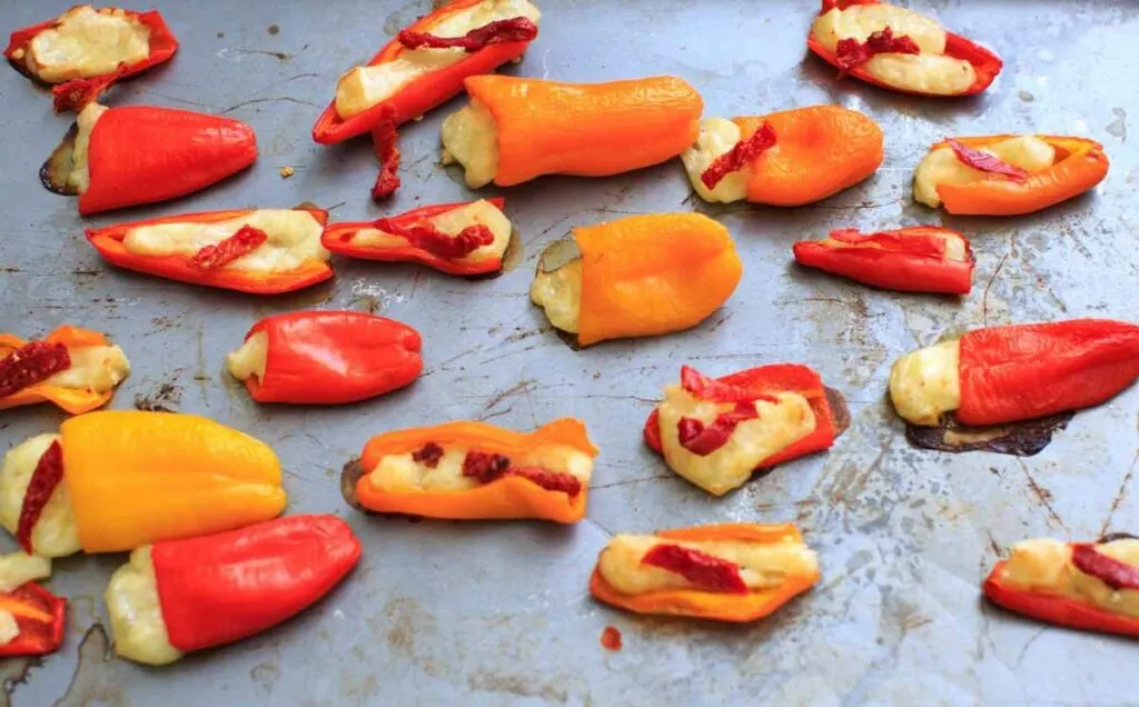 Mini Sweet Pepper Bites with Brie and Sun Dried Tomatoes. A quick vegetarian appetizer or finger food with only 3 ingredients.