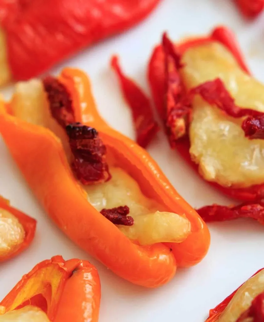 Mini Sweet Pepper Bites with Brie and Sun Dried Tomatoes. A quick vegetarian appetizer or finger food with only 3 ingredients.