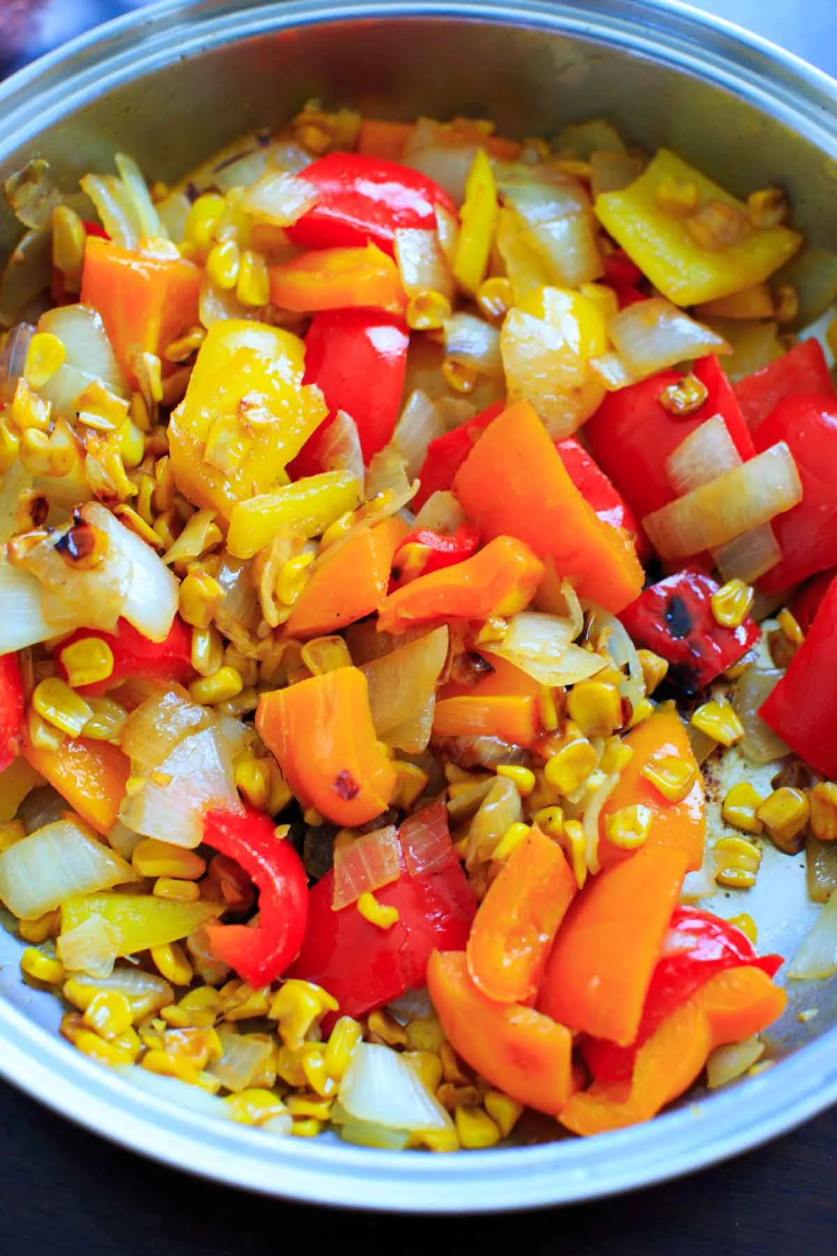 Black Bean Enchilada Casserole with Roasted Corn and Bell Peppers. Vegetarian dinner full of veggies and homemade goodness.