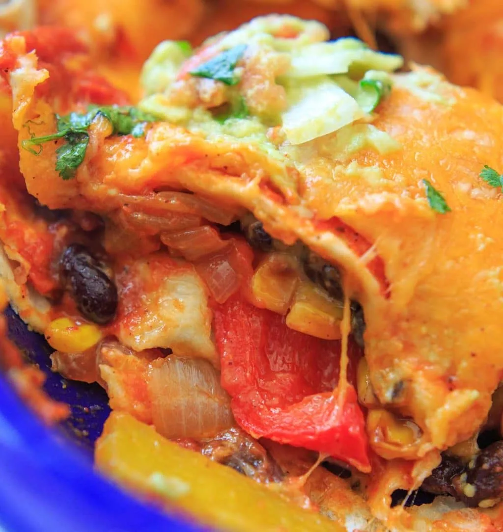 Black Bean Enchilada Casserole with Roasted Corn and Bell Peppers. Vegetarian dinner full of veggies and homemade goodness.