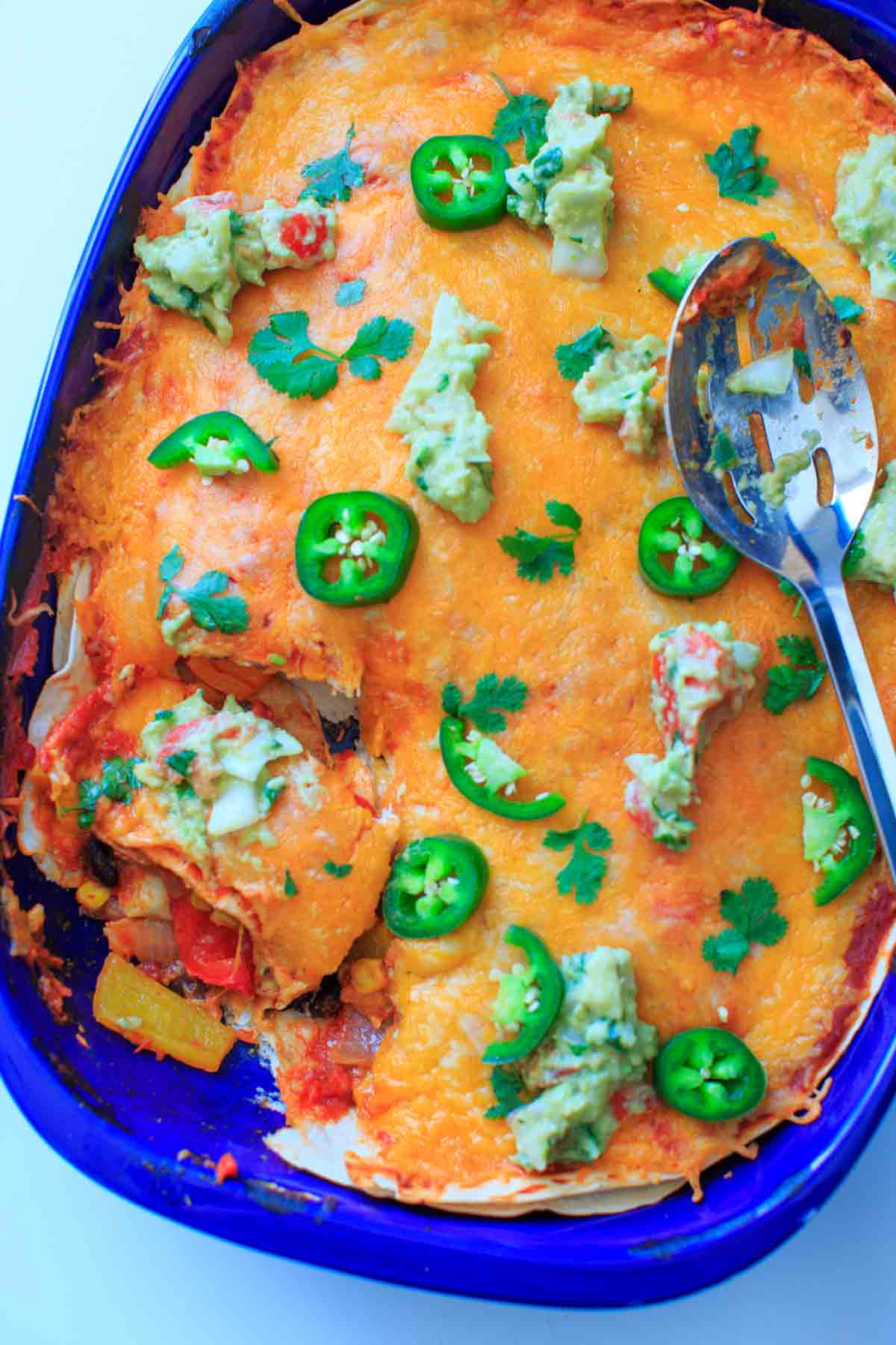 Black Bean Enchilada Casserole with Roasted Corn and Bell Peppers. Vegetarian dinner full of veggies and homemade goodness.