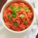 Spanish Cauliflower Rice - a grain-free substitute for Spanish rice that's quick and healthy. Vegan and gluten-free option.