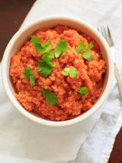 Spanish Cauliflower Rice - a grain-free substitute for Spanish rice that's quick and healthy. Vegan and gluten-free option.