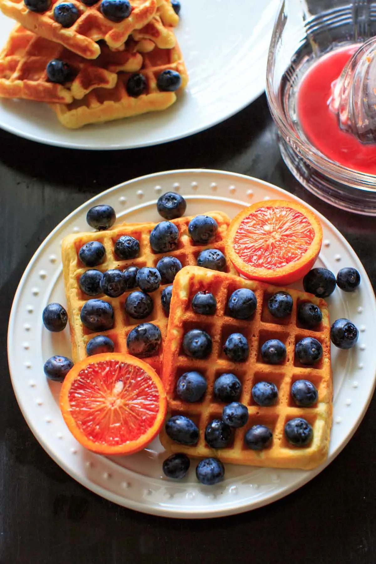 Belgian Waffles made healthy with split red lentils, blood orange juice and blueberries. Breakfast doesn't get any better than this!