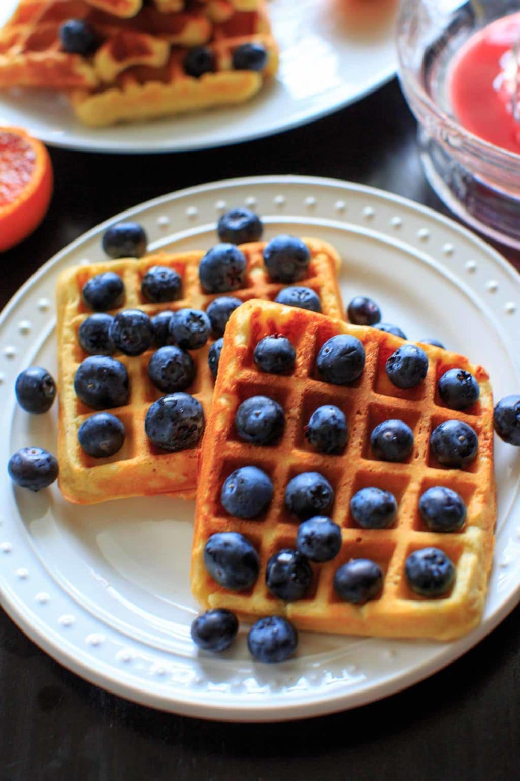 Belgian Waffles made healthy with split red lentils, blood orange juice and blueberries. Breakfast doesn't get any better than this!