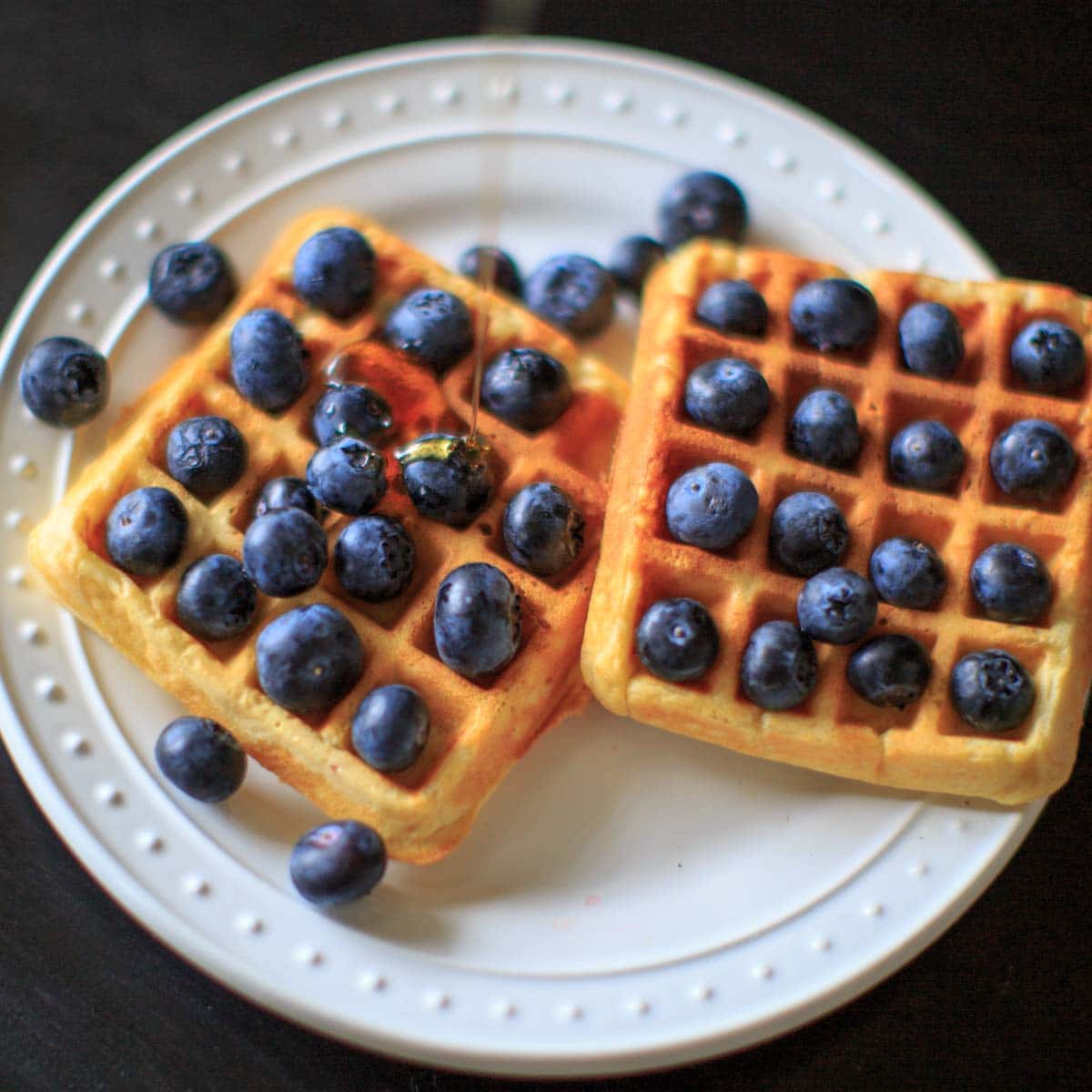 Belgian Waffles made healthy with split red lentils, blood orange juice and blueberries. Breakfast doesn't get any better than this!