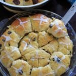 Hot Cross Buns with the options for added dark chocolate pieces and raisins and/or dried cherries. Makes two dozen.