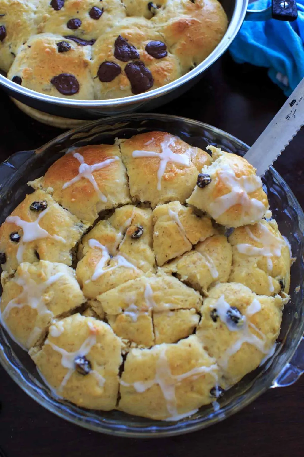 Hot Cross Buns with the options for added dark chocolate pieces and raisins and/or dried cherries. Makes two dozen.