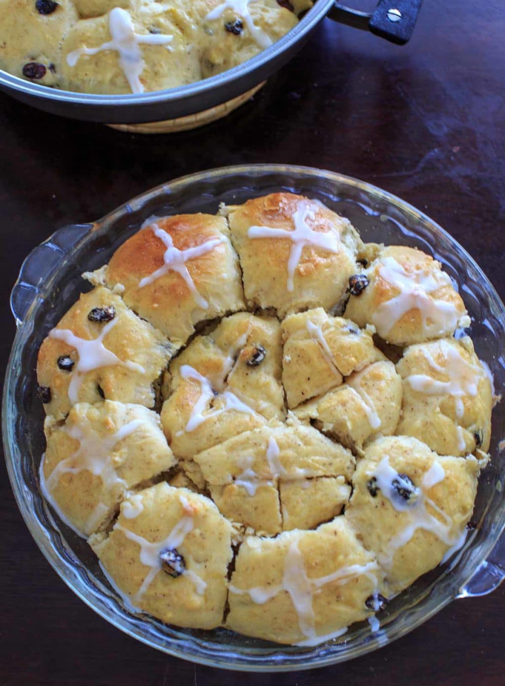 hot cross buns in round glass baking dish