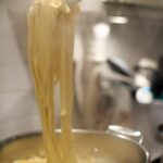 Dinner Party: How to make your own pasta from scratch. Cooked noodles.