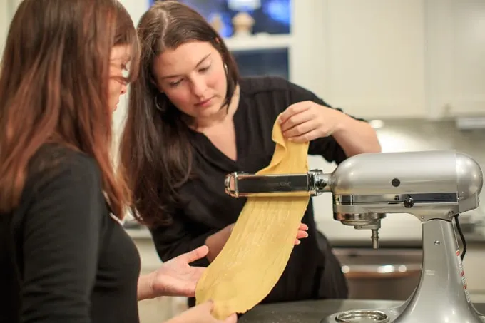 Dinner Party: How to make your own pasta from scratch. Flattening the dough.
