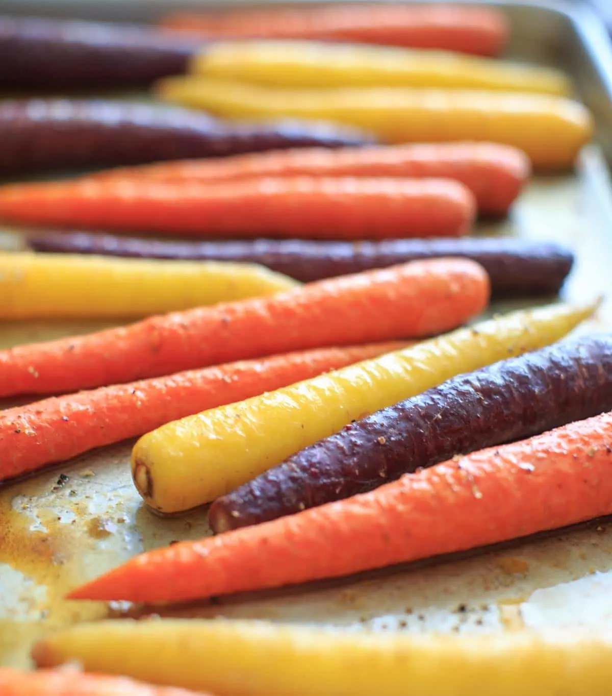close up of maple roasted colorful carrots