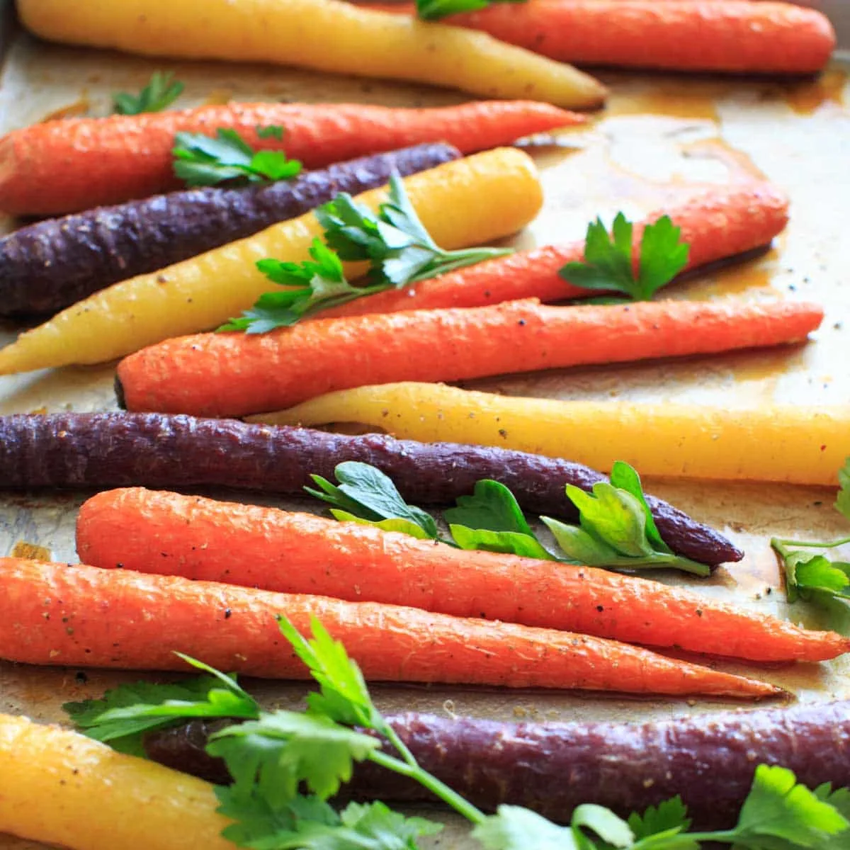 Maple roasted carrots on baking sheet