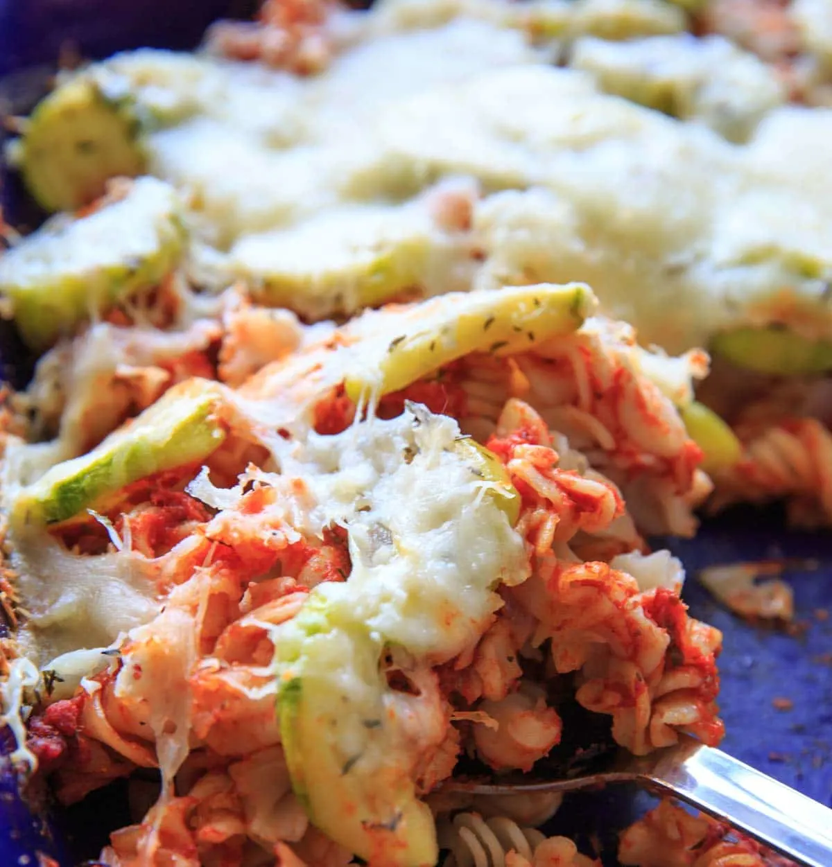 Zucchini Pasta Casserole with thyme. A super easy and healthy casserole that is healthy and easily gluten-free. With few ingredients (5 ingredients or less), dinner will be on the table in no time! Up close shot of pasta casserole.