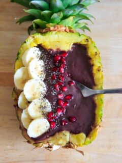 Pineapple Acai Smoothie Bowl or Boat. Lots of tropical fruit vibes and a handful of greens make this smoothie a refreshing treat! Superfoods + optional protein.