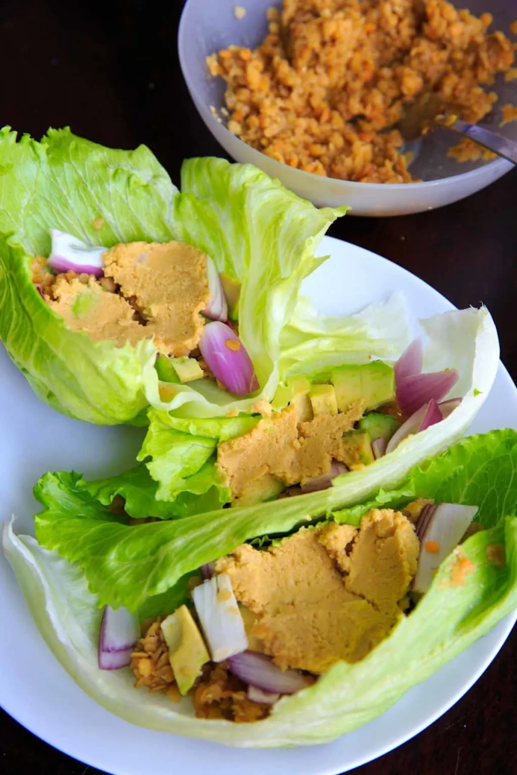 Lentil lettuce wraps with lemon garlic hummus. Healthy, easy, customizable and full of flavor!