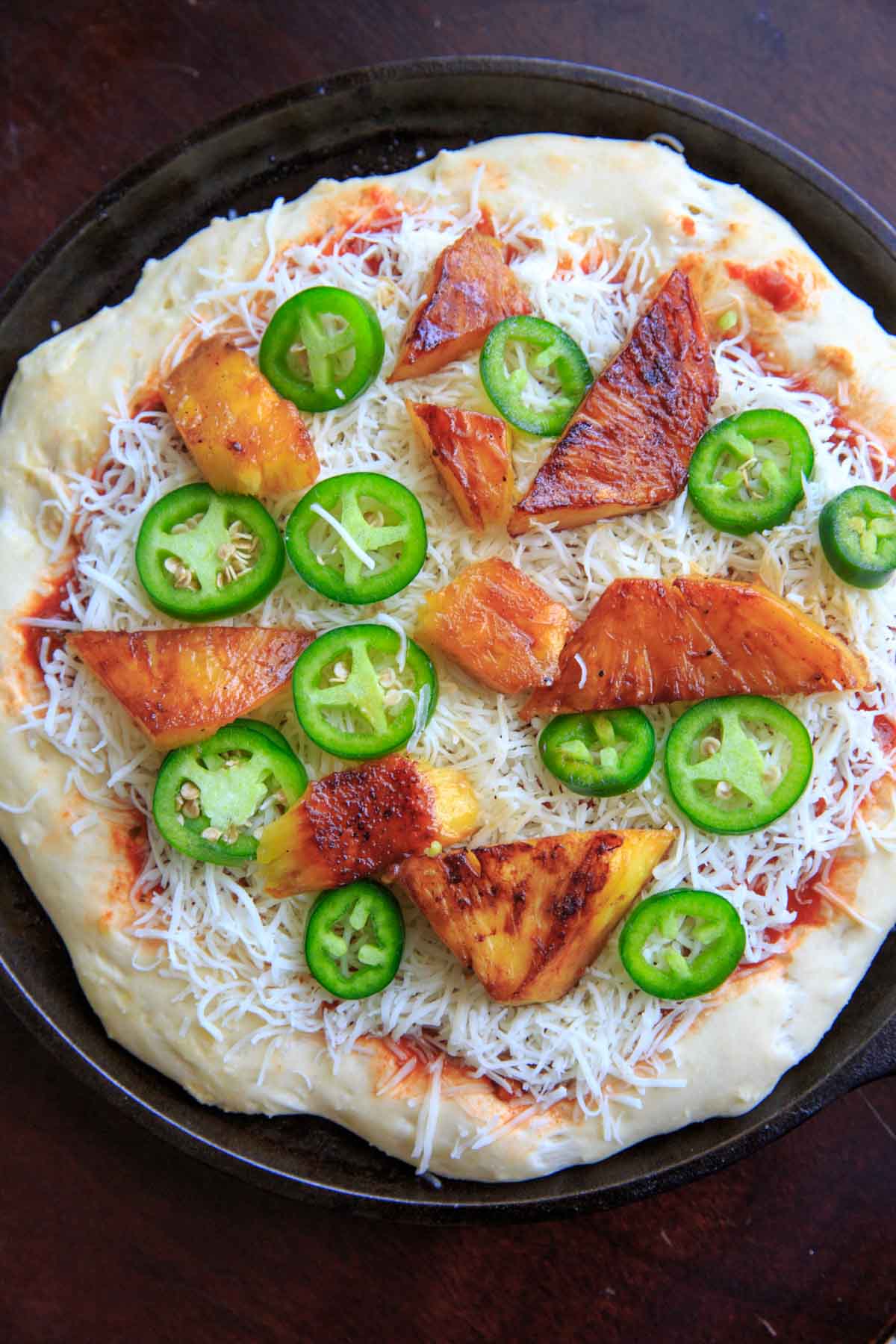 Grilled pineapple and jalapeno pizza, before baking.