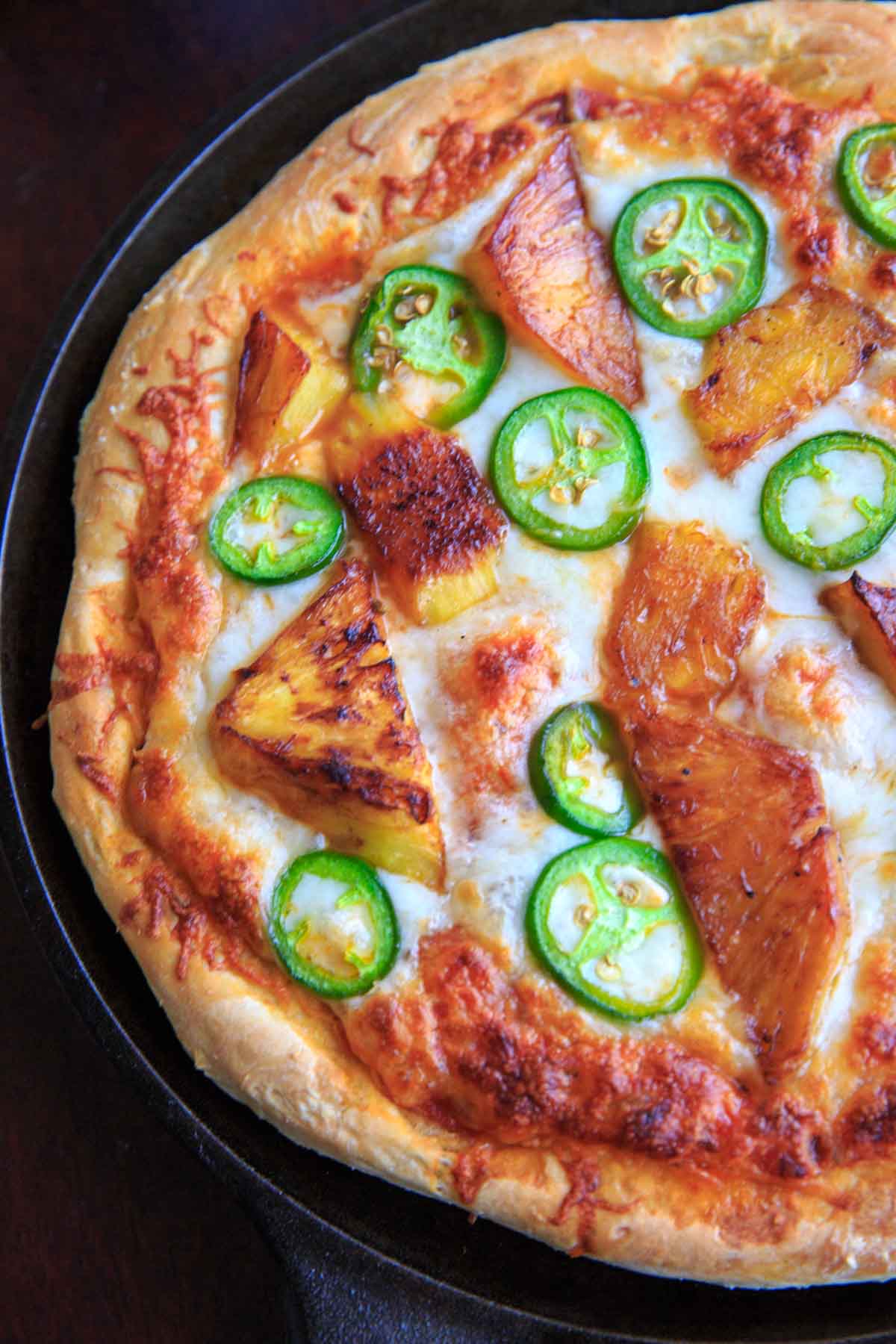 Grilled pineapple and jalapeno pizza. Sweet and spicy combo for people who like pizza with a twist!