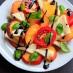 Peach Caprese Salad is a wonderful summer side dish, appetizer or even a meal! Mozzarella cheese, tomatoes, peaches and basil makes a fresh and satisfying dish.