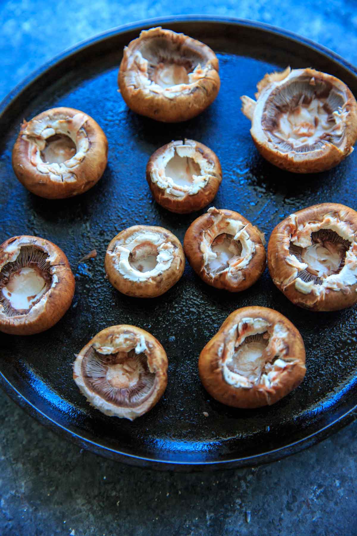 Chevre Stuffed Mushrooms with Sun-dried Tomatoes - empty mushrooms before stuffing