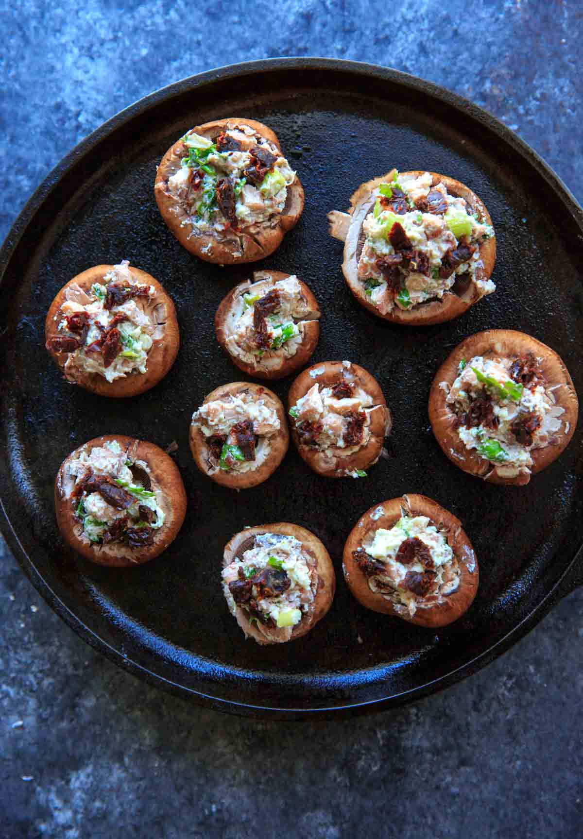 Chevre Stuffed Mushrooms with Sun-dried Tomatoes - stuffed mushrooms before baking