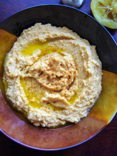 Lemon Garlic Hummus is a quick and easy, vegan and gluten-free snack dip for your favorite crackers or veggies!