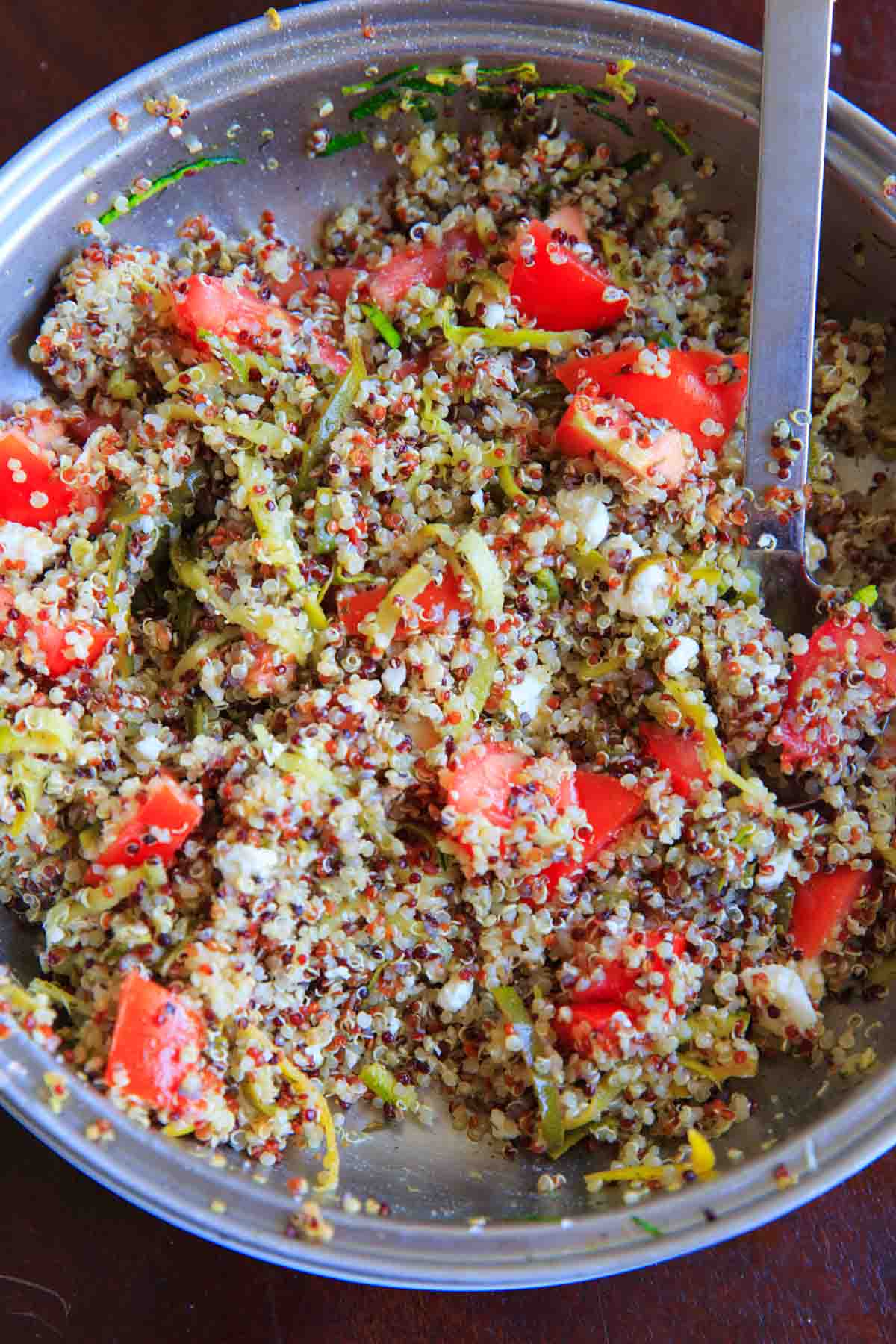 Spiralized Zucchini Quinoa Tomato Salad. Eat as a side or a meal, cold or hot! Healthy, vegetarian, delicious.