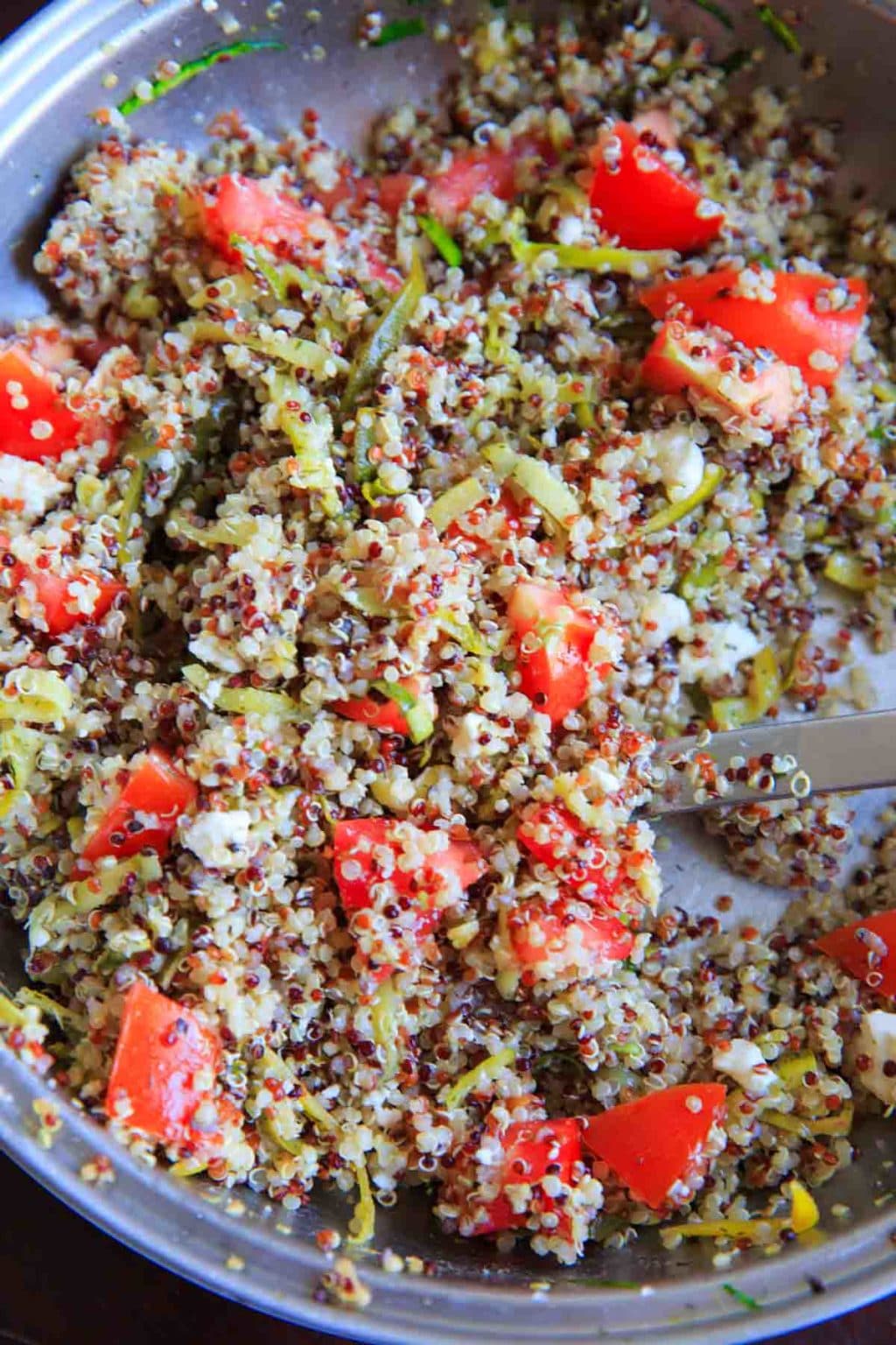 Spiralized Zucchini Quinoa Tomato Salad. Eat as a side or a meal, cold or hot! Healthy, vegetarian, delicious.