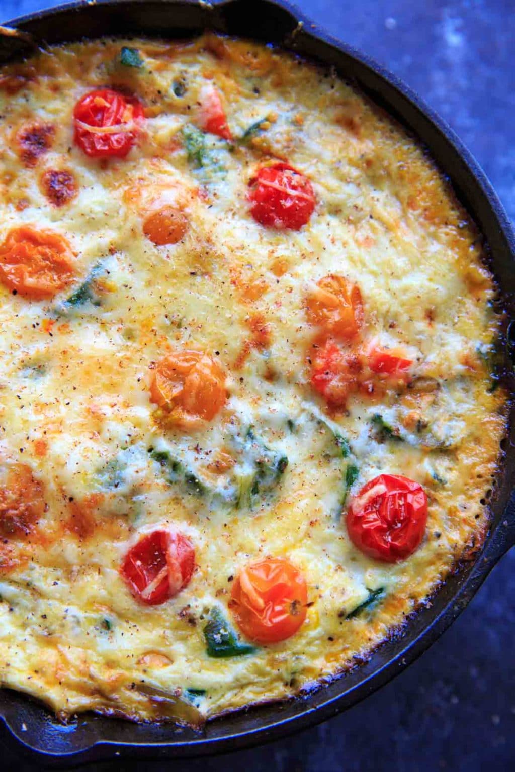 Zucchini Spinach Frittata with Mini Heirloom Tomatoes. Quick and easy meal to whip up for brunch or breakfast for dinner!