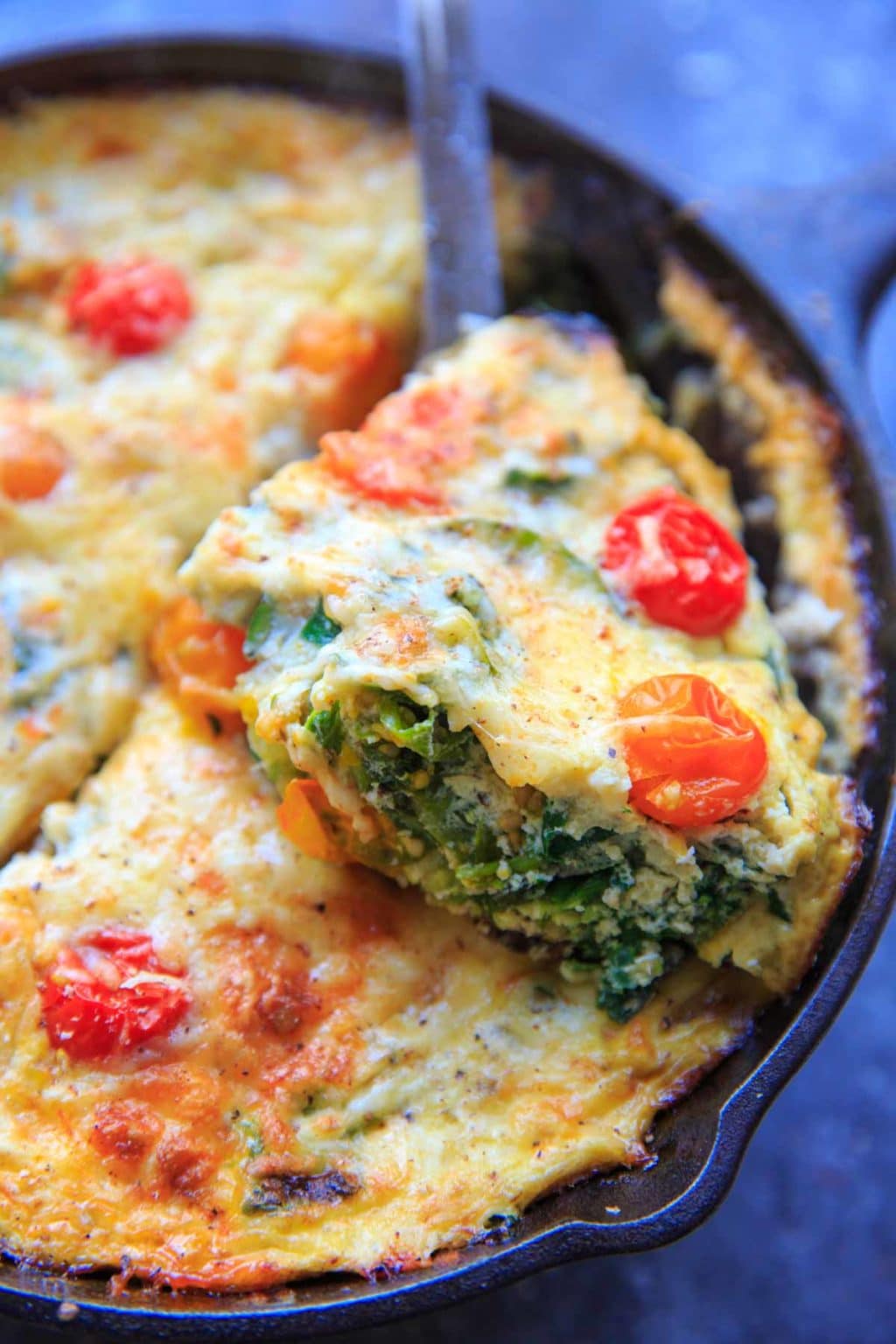 Zucchini Spinach Frittata with Mini Heirloom Tomatoes. Quick and easy meal to whip up for brunch or breakfast for dinner!