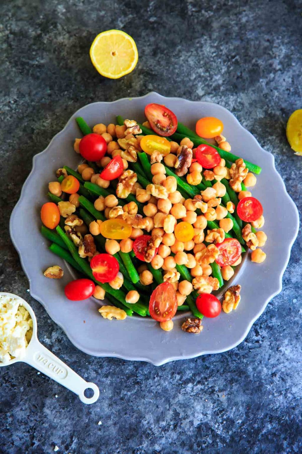 Green Bean Chickpea Salad with tomato, walnuts and feta. A great appetizer or side dish for dinners or holiday gatherings!