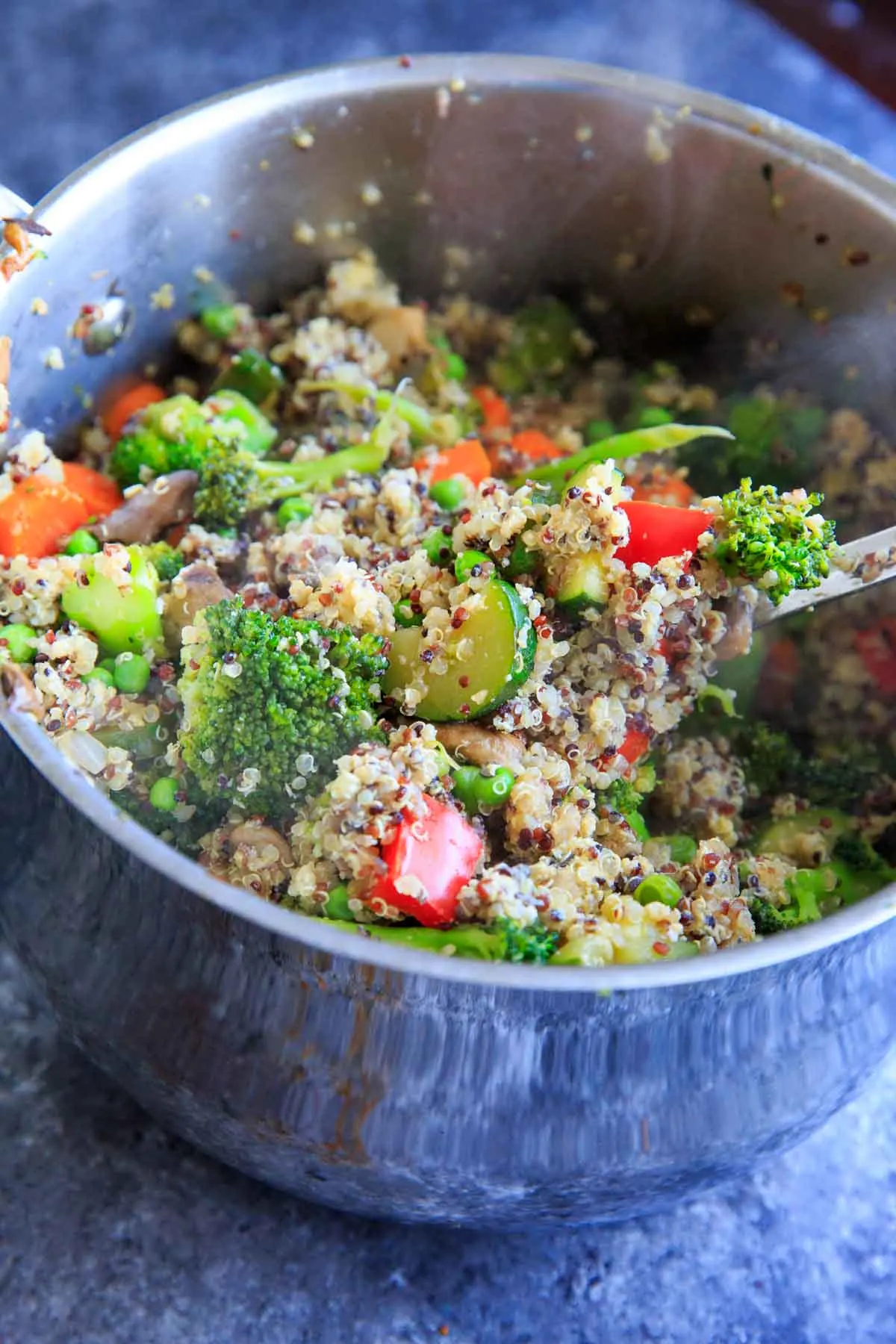 Veggie Loaded Quinoa Fried "Rice." A delicious dinner packed with vegetables and full of flavor!