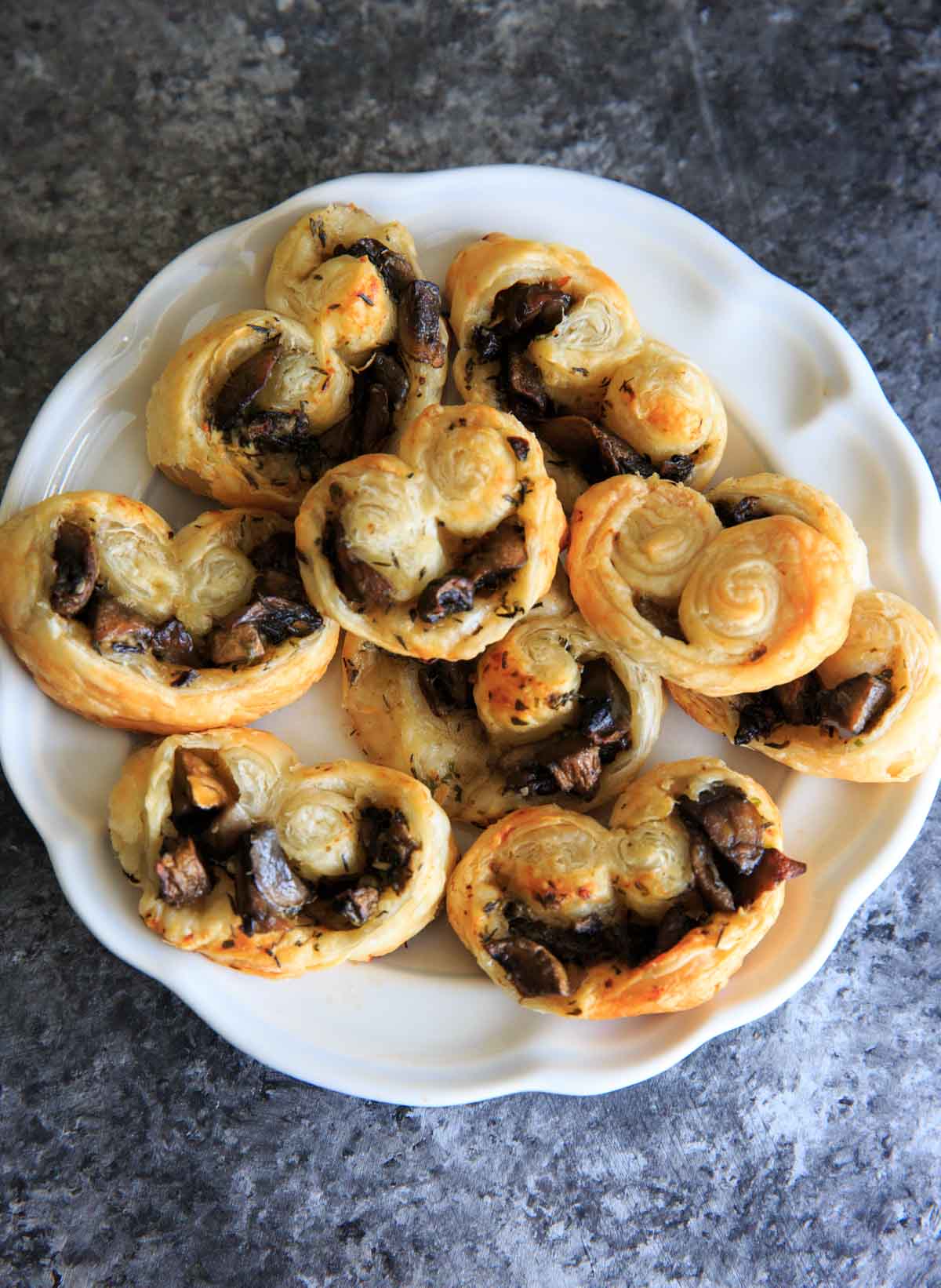 Savory Mushroom Palmiers on white plate