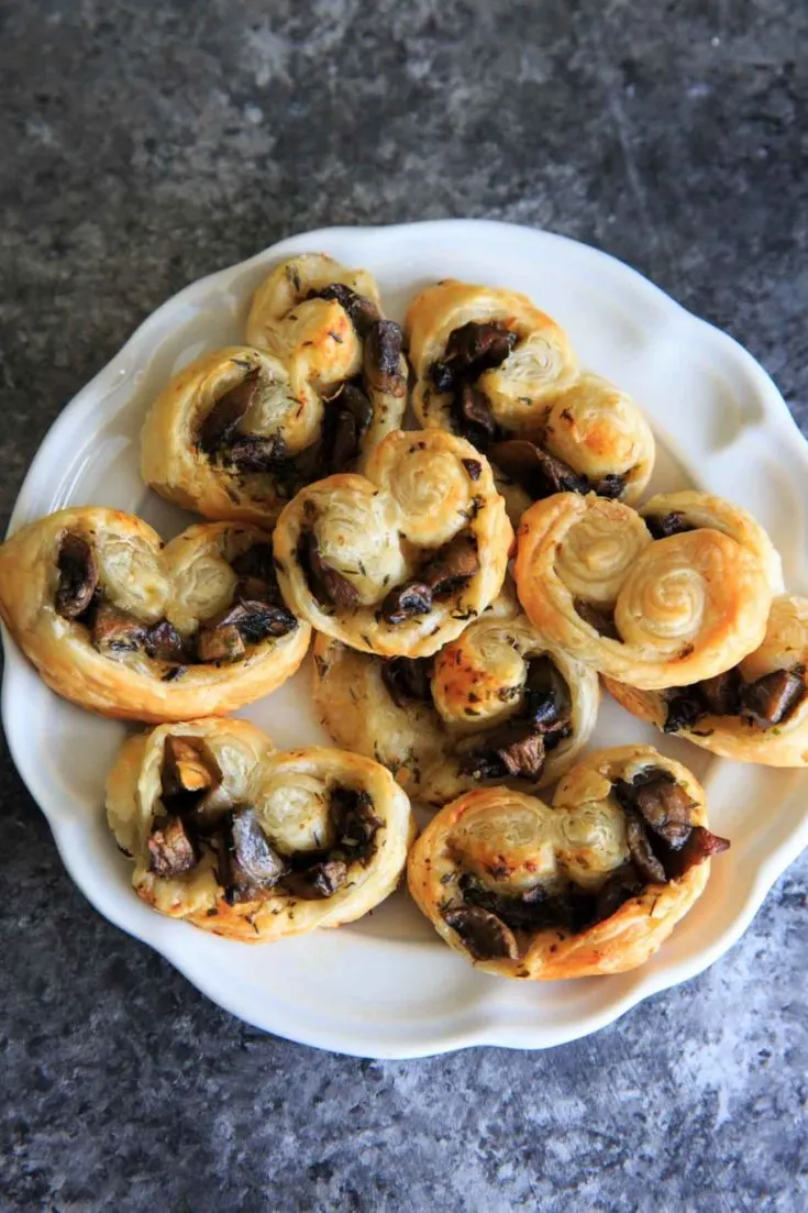 Savory Mushroom Palmiers - a savory version of the puff pastry treat that can be served as a delicious appetizer or side. Especially great for holidays or dinner parties!
