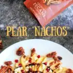 Sweet and savory pear nachos with glazes pecans, chevre cheese, pomegranate seeds and balsamic. A unique no-bake snack or dessert!