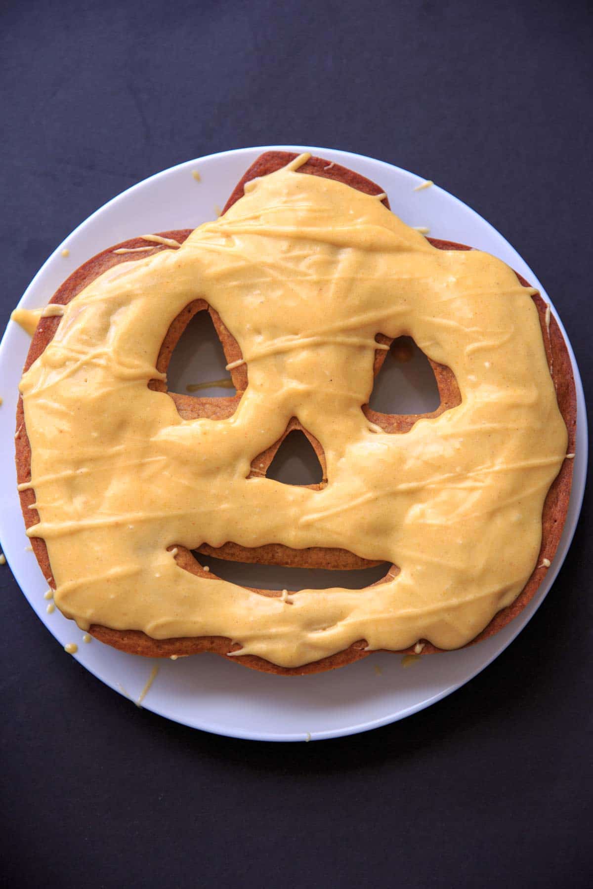 Pumpkin Cake with Pumpkin Cream Cheese Icing. Drizzled icing