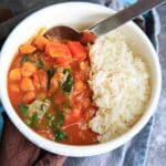 Pumpkin Chickpea Curry with Kale, served with rice or quinoa is a hearty vegan and gluten-free meal!