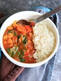 Pumpkin Chickpea Curry with Kale, served with rice or quinoa is a hearty vegan and gluten-free meal!