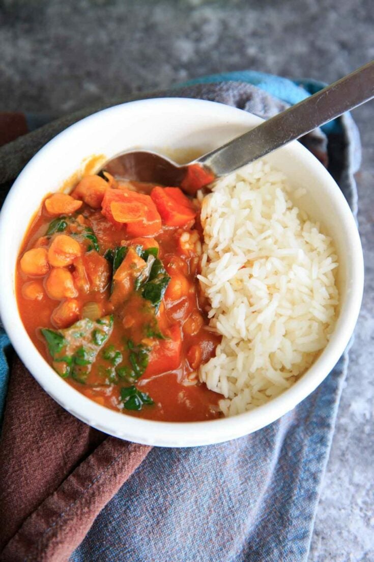 Pumpkin Chickpea Curry with Kale, served with rice or quinoa is a hearty vegan and gluten-free meal!